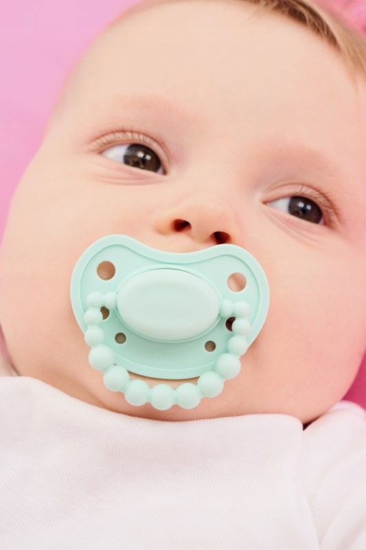 Smoczek pozycjonujący LUU Kids Vivid Mint 0-3 miesięcy